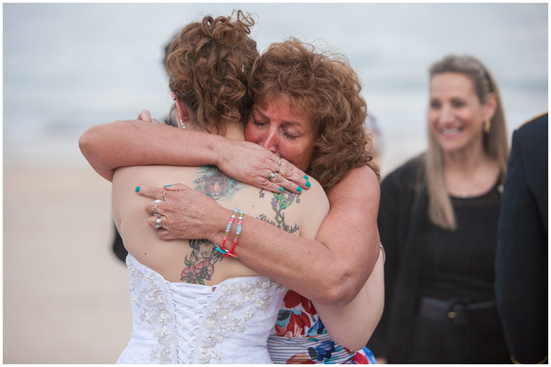 Bride hugging her mother an emotional moment Montauk NY