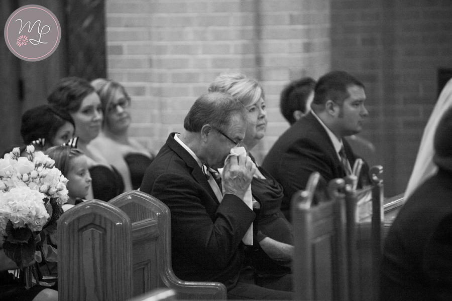During the ceremony I try very hard to have eyes everywhere. If I was just focused on the bride and groom I'd miss sweet moments like this one. The father of the bride wiping a tear away is one of my favorite moments of the ceremony.