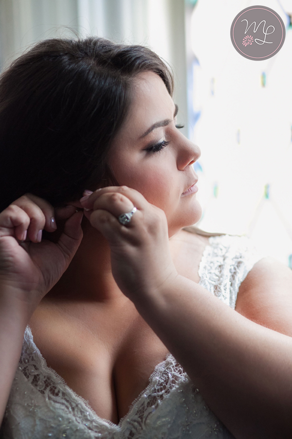 Earrings and I are best friends! Every time a bride puts on her earrings, it creates a gorgeous bridal portrait. 