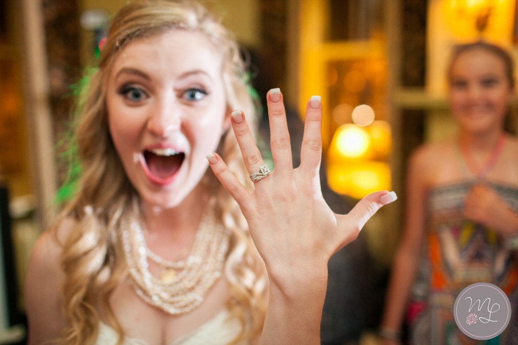 Jocelyn showing off her wedding rings at her reception at the Lincklaen House