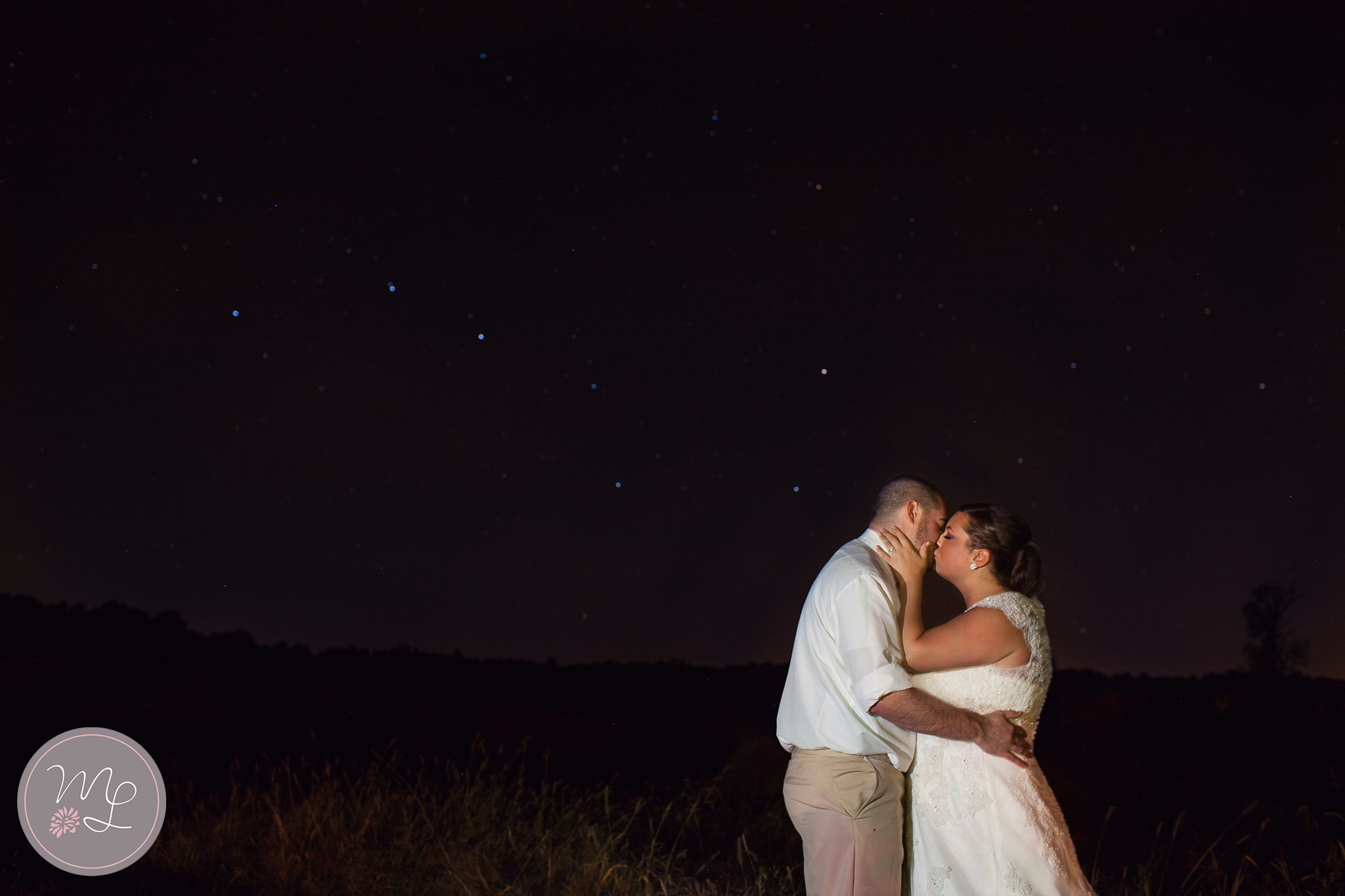 The big dipper looked over Chris & Lindsey's shoulder as they shared a wedding kiss! Photo by Mabyn Ludke Photography