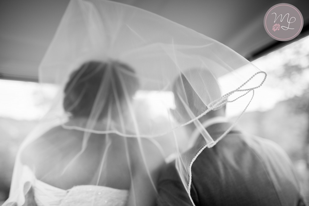 Liz had a beautiful veil that loved to flow in the wind while they rode in the golf cart around Calistoga Ranch. Photography by Mabyn Ludke