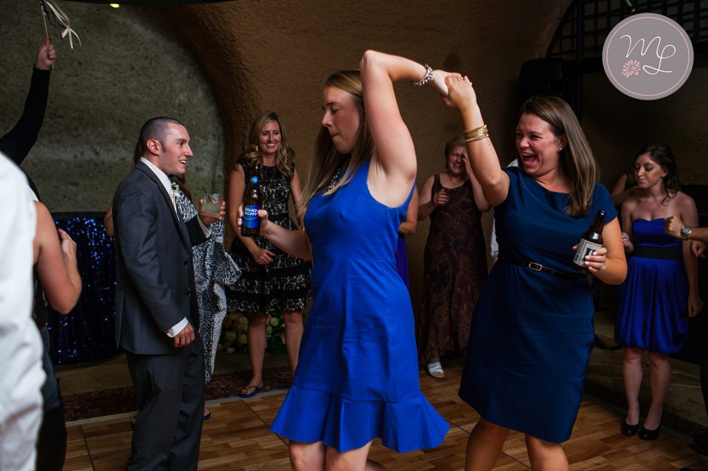 friends, drinks, and amazing dance moves were all thanks to AMS Entertainment at Liz & Steve's Calistoga Ranch wedding. Mabyn Ludke Photography