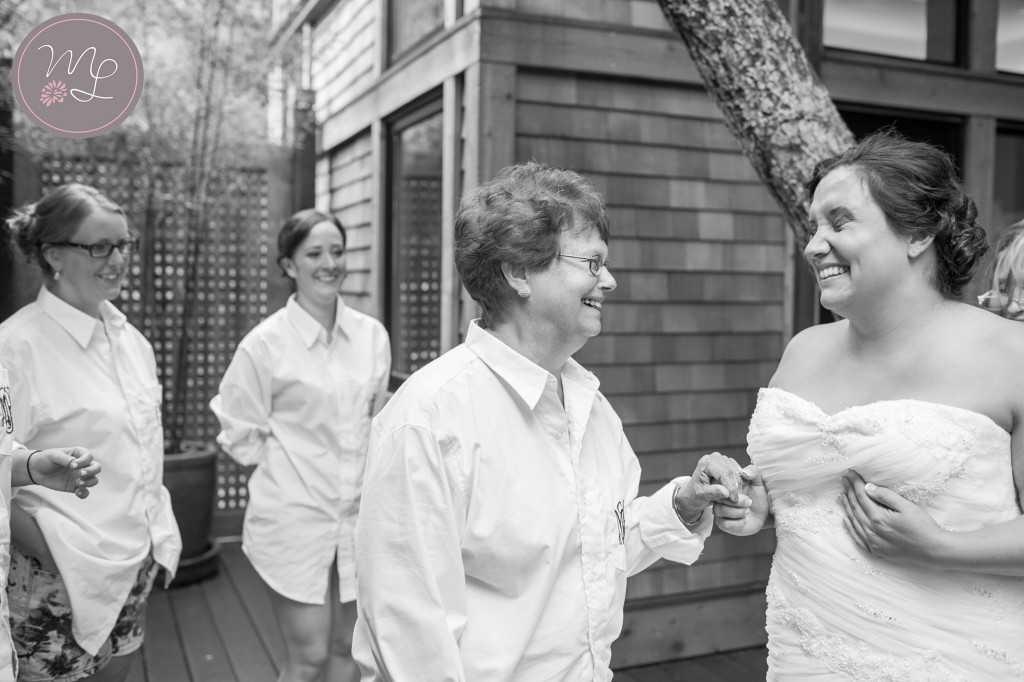 The mother of the bride and her beautiful daughter spending a sweet moment together as Liz gets ready. Mabyn Ludke Photography