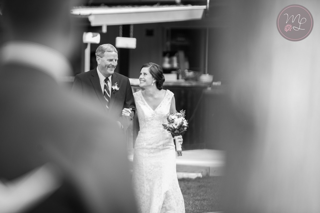 A sweet moment as the father of the bride walks his daughter down the isle. Mabyn Ludke Photography
