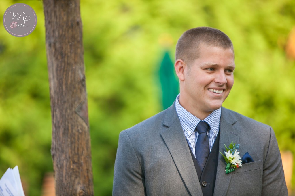The groom's face as his bride walks down the isle. Mabyn Ludke Photography