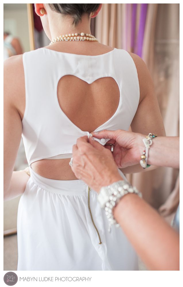This heart shaped back is a unique detail to a bride's wedding dress. Kernersville, NC Wedding Photographer Mabyn Ludke