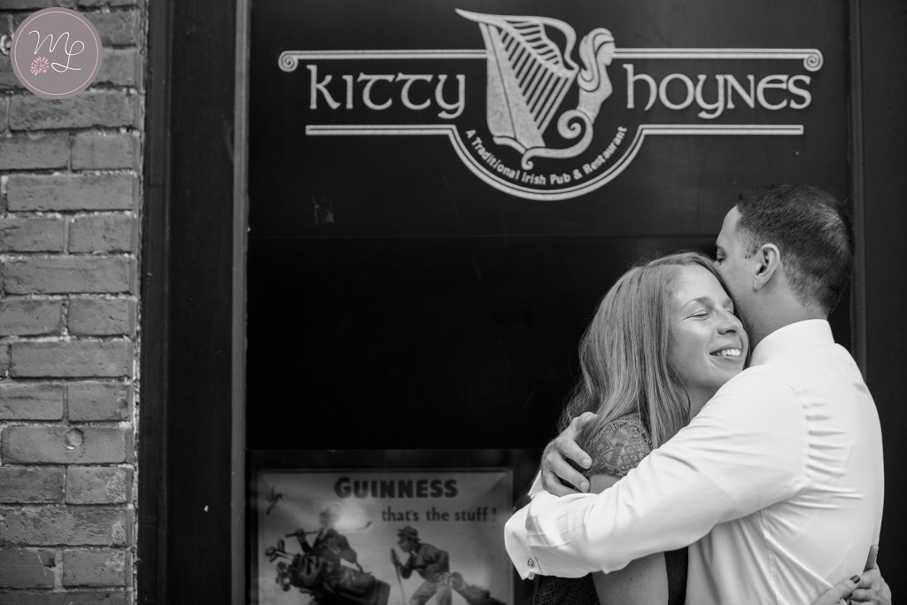 An engagement session in front of the Kitty Hoynes Irish Pub in Syracuse.