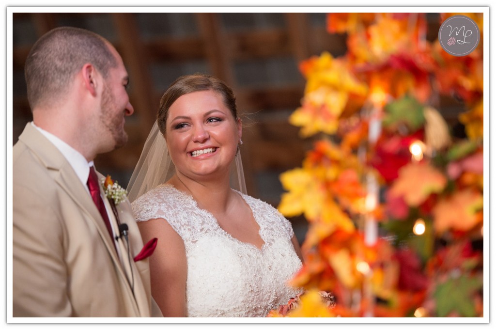 Bride and groom say their vows at MKJ Farm, as photographed by Mabyn Ludke Photography.