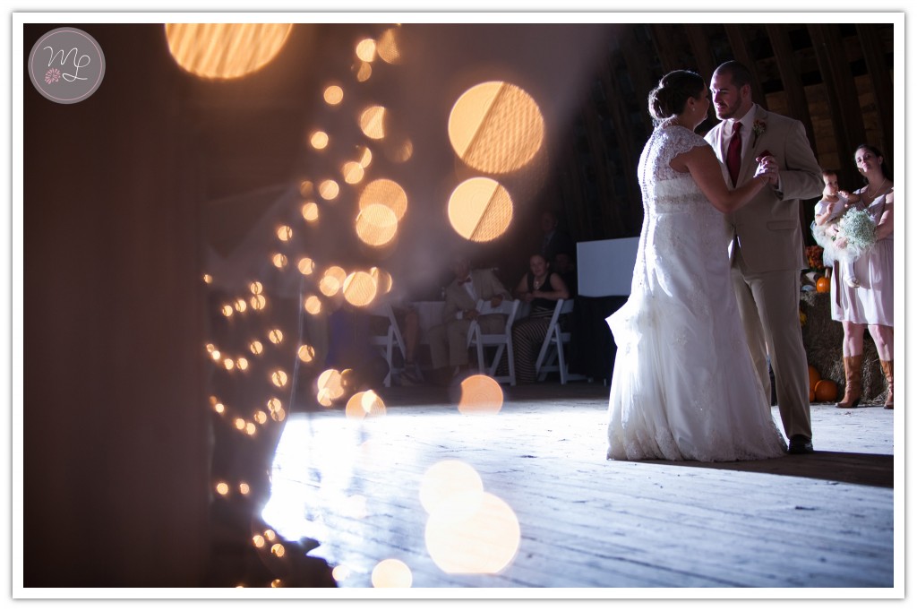 Artistic wedding photograph by Mabyn Ludke of the bride and groom's first dance at MKJ Farms. 