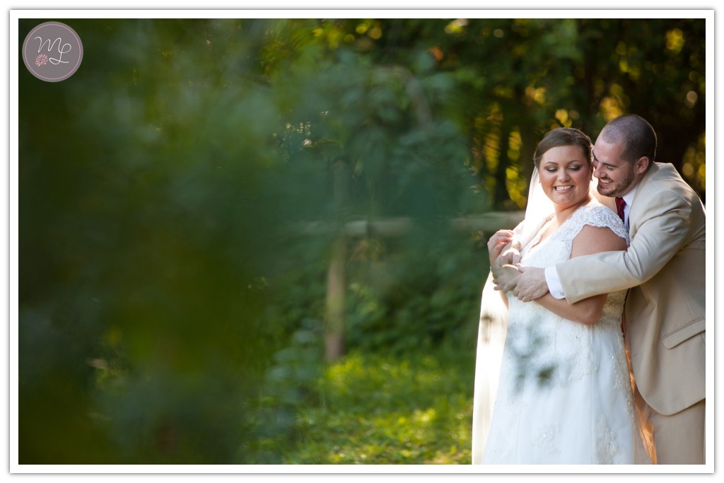 Romantic wedding photographer in Greensboro captures this sweet moment between bride and groom.