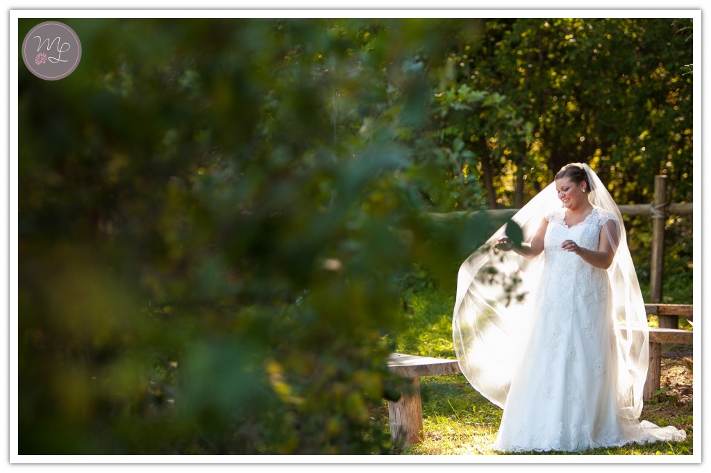 Mabyn Ludke Photography, a greensboro wedding photographer, captures the bride in her white bridal gown. 