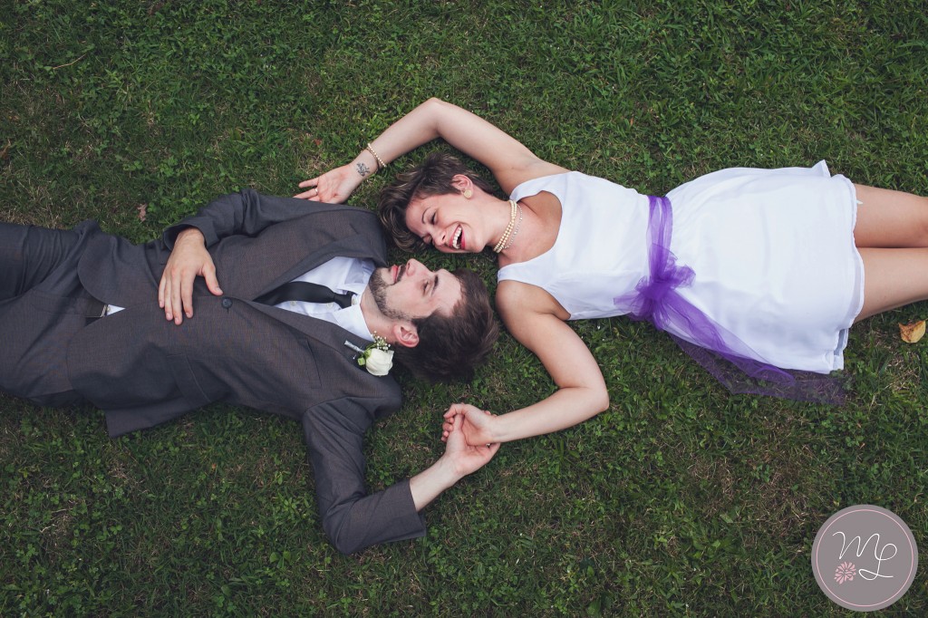 Greensboro, NC Wedding Photographer Mabyn Ludke Photography captures this newly wed couple laying down on the job!