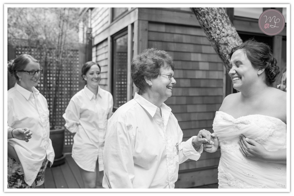 Mother of the bride & bride share a moment while getting ready for the wedding. Mabyn Ludke Photography