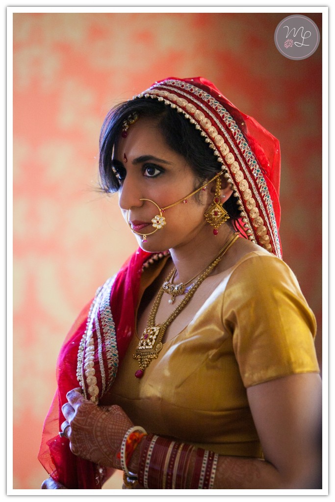 In Chapel Hilll a gorgeous Indian bride prepares to walk down the isle at the Carolina Inn. Photo by Mabyn Ludke
