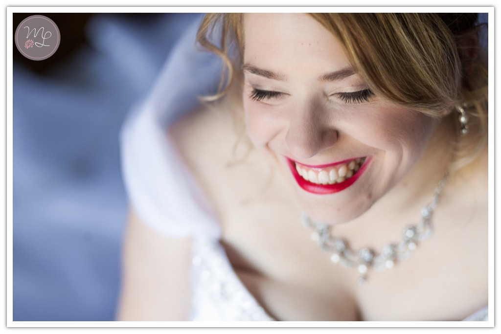 Mabyn Ludke captures this bride's laughter & excitement moments before she see's her groom to be at North Carolina's Groome Inn. 