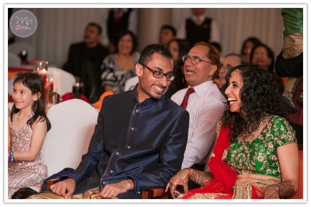 Rachna and Bharat enjoy watching traditional performances by their friends and family at the Sheraton of Chapel Hill.