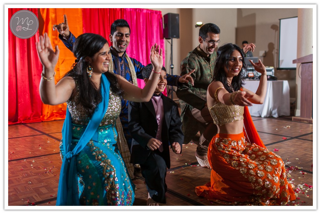 dancing and performances at a traditional Sangeet at the Sheraton of Chapel Hill. Photographed by Chapel Hill wedding photographer.
