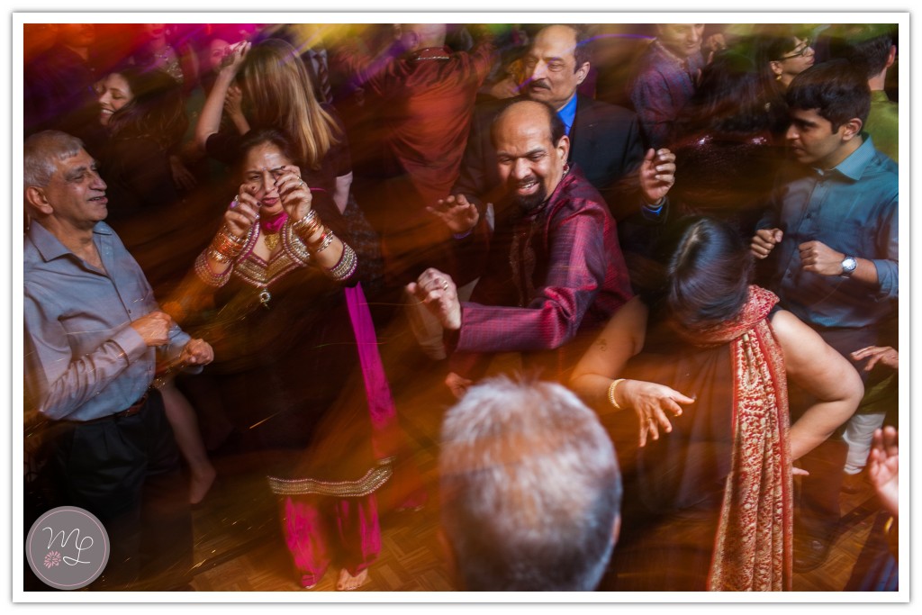 Fun and dancing captured by wedding photographer in Chapel Hill, NC, Mabyn Ludke Photography.