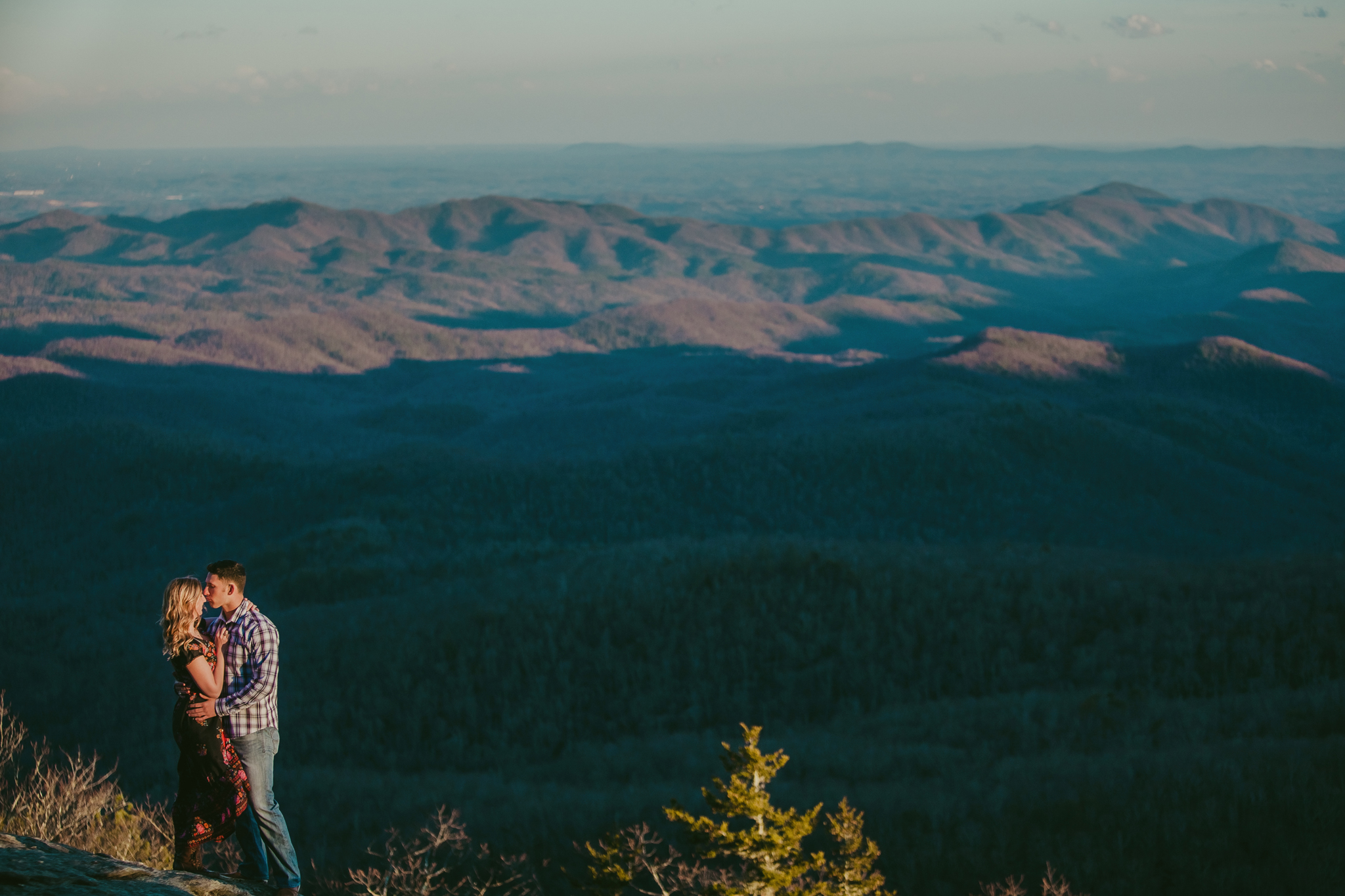 A gorgeous mountain view for this engaged couple during their photography session by Mabyn Ludke in the mountains of NC