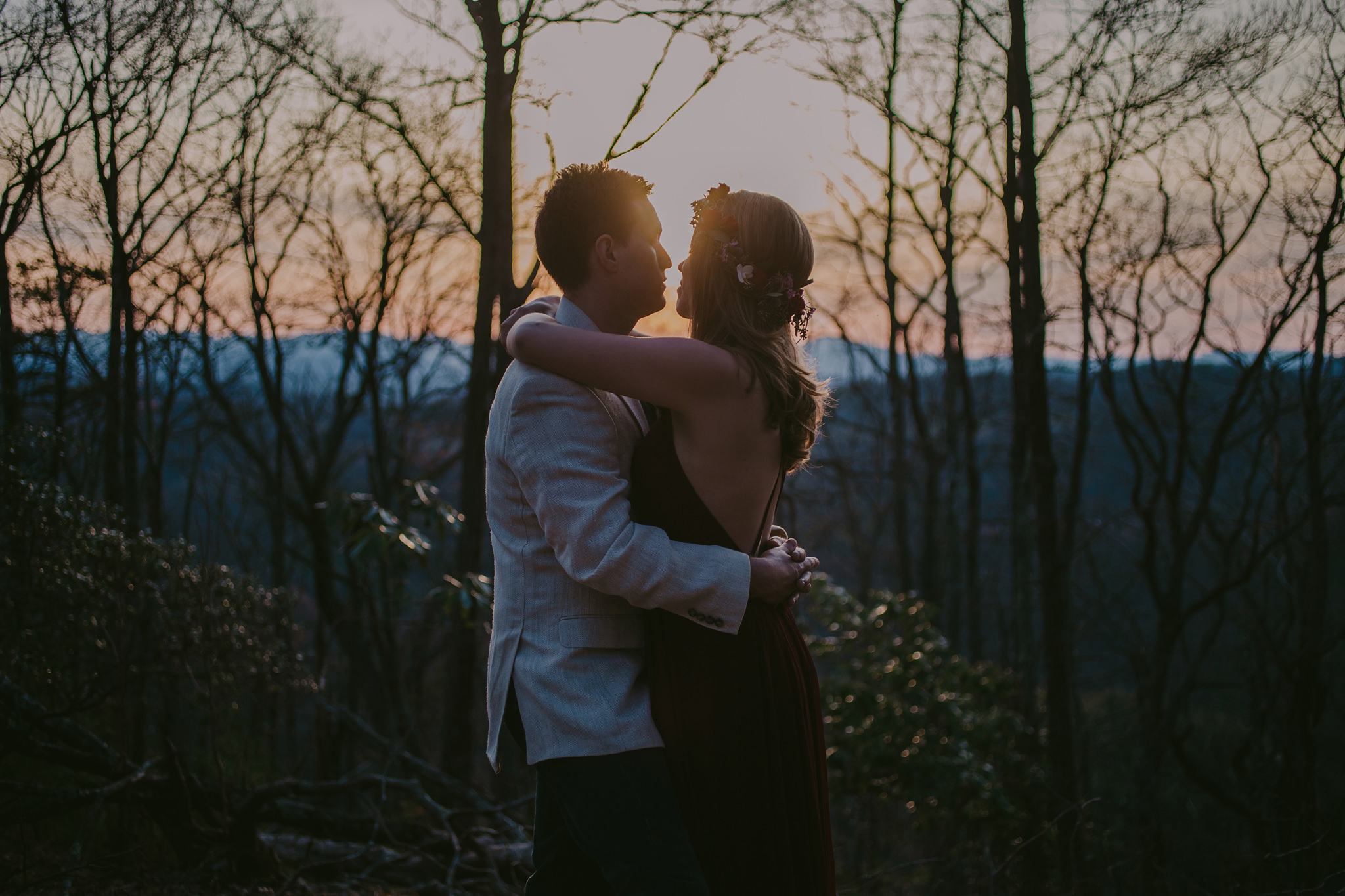 The woods in Doughton Park area beautiful backdrop for this gorgeous couple during their mountain anniversary session in NC. Mabyn Ludke Photography.