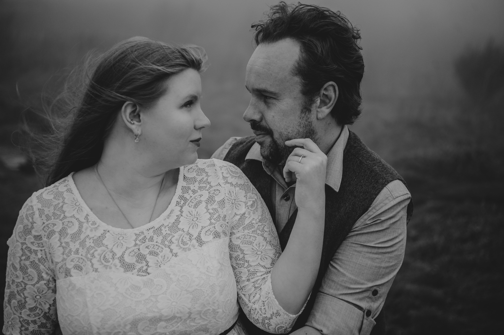 A beautiful black and white of an engaged couple a top Black Balsam Knob in Asheville, NC photo by Mabyn Ludke