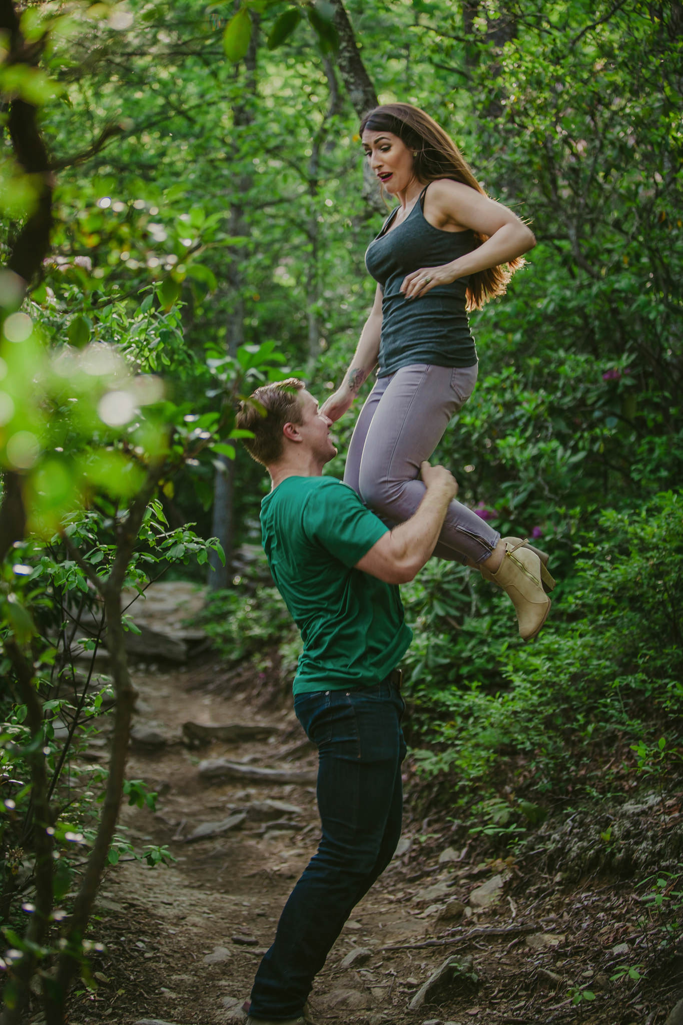 Couple has fun on the Hawksbill Mountain Trail near Linville, NC with Mabyn Ludke Photography