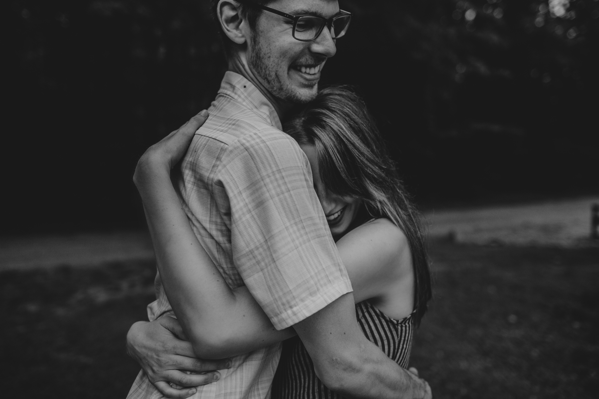 Black and White of couple hugging at the Timberlake Earth Sanctuary in Greensboro, NC