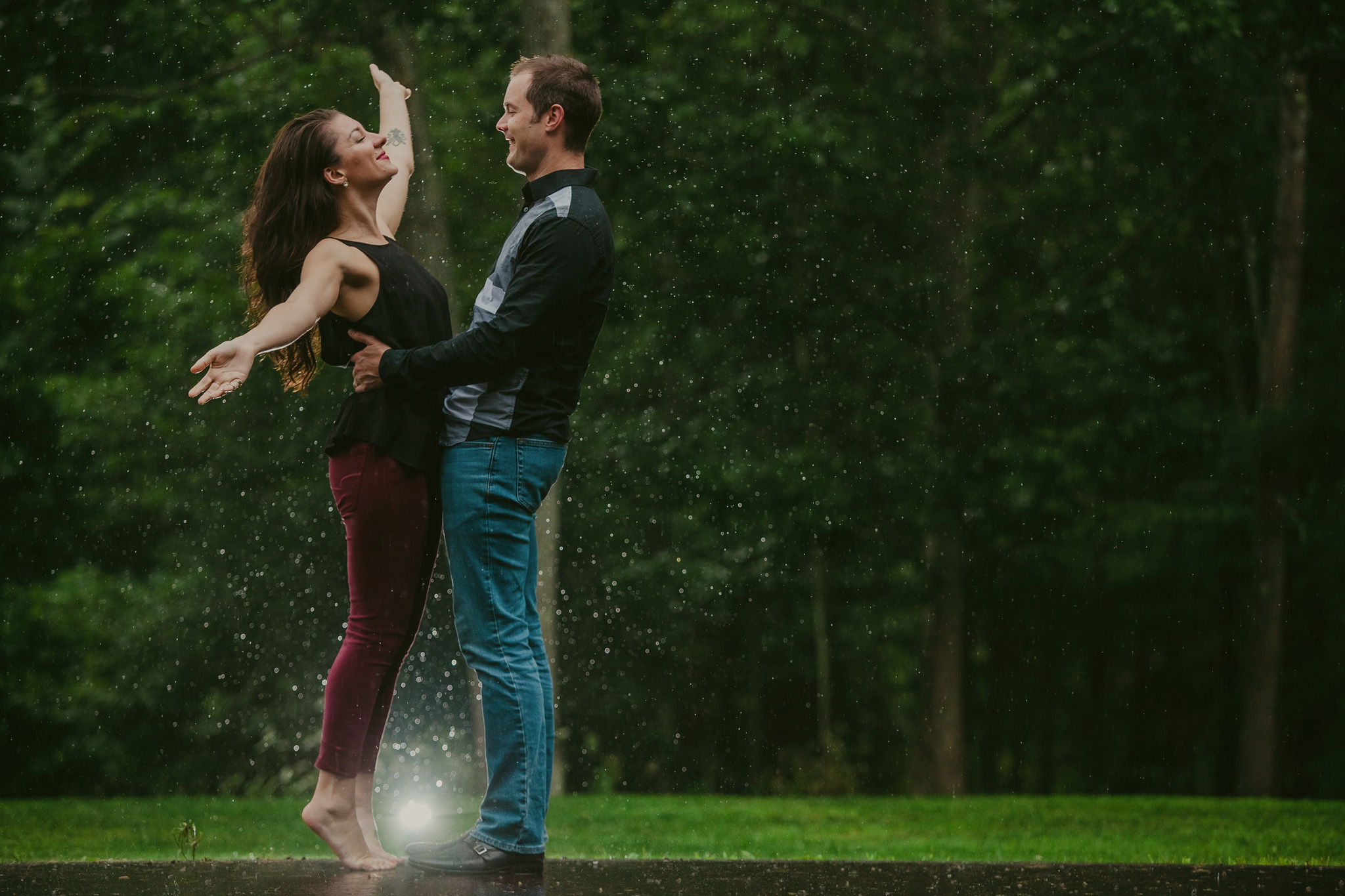 Couple dances in the rain in Charlotte, NC