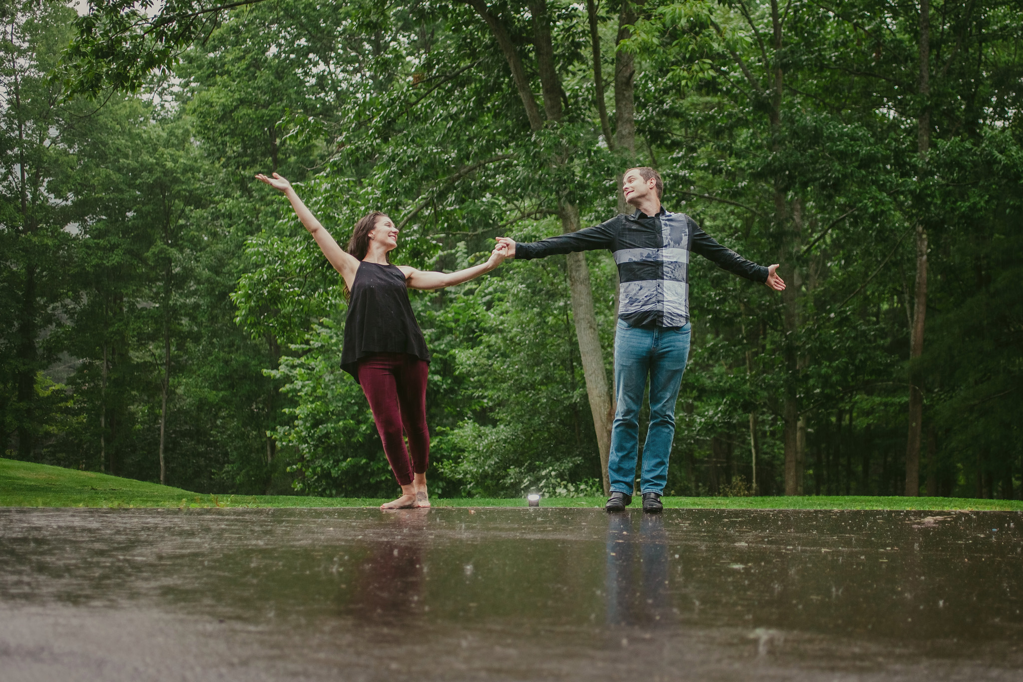 couple loves the rain at their anniversary shoot in Charlotte, NC