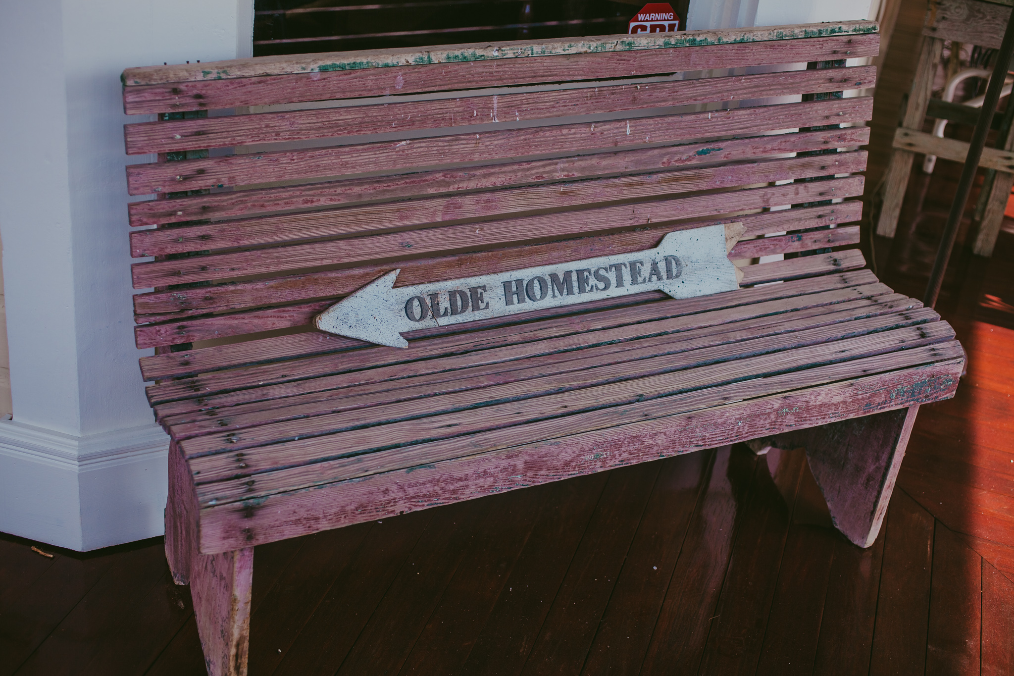 Cute bench with sign at the Alexander Homestead