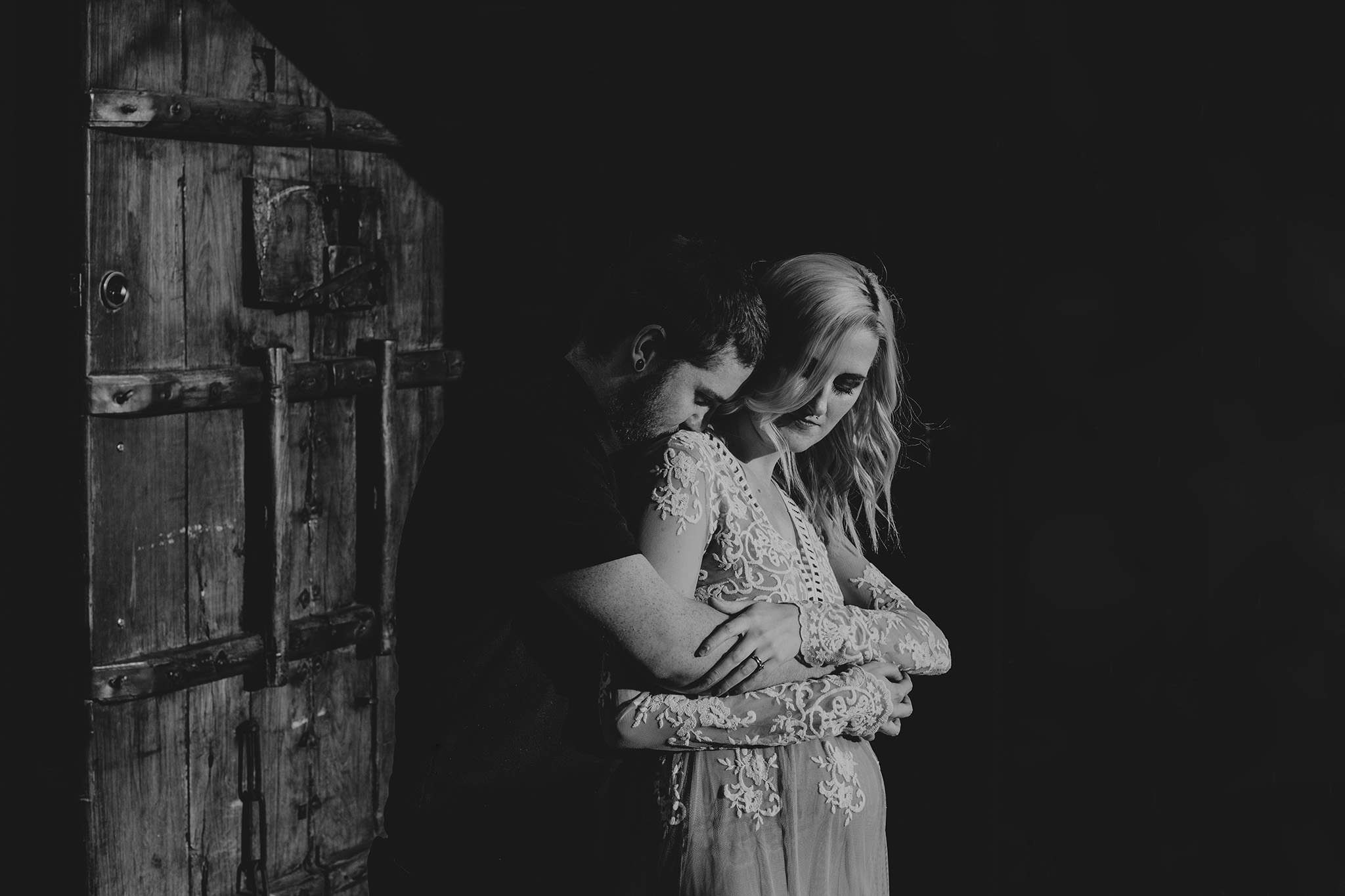 A dramatic black and white photo during this charlotte maternity session