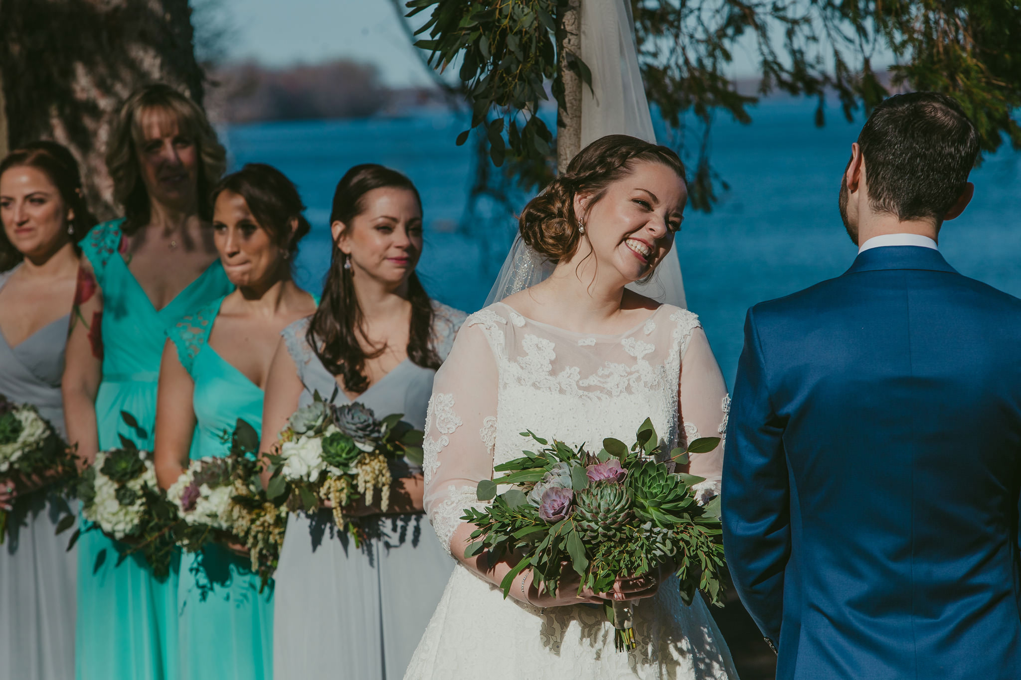 A happy bride gazes lovingly at her groom at Glen Foerd on the Delaware