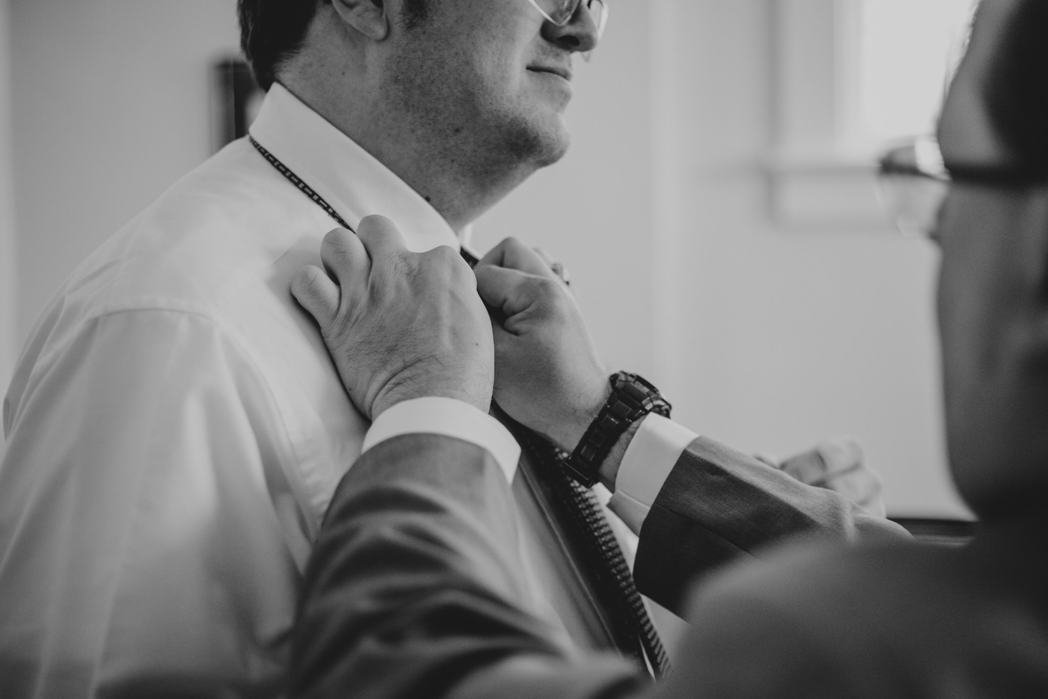 Brotherly hands help this groom prepare for his Shuford House Wedding in Hickory, NC