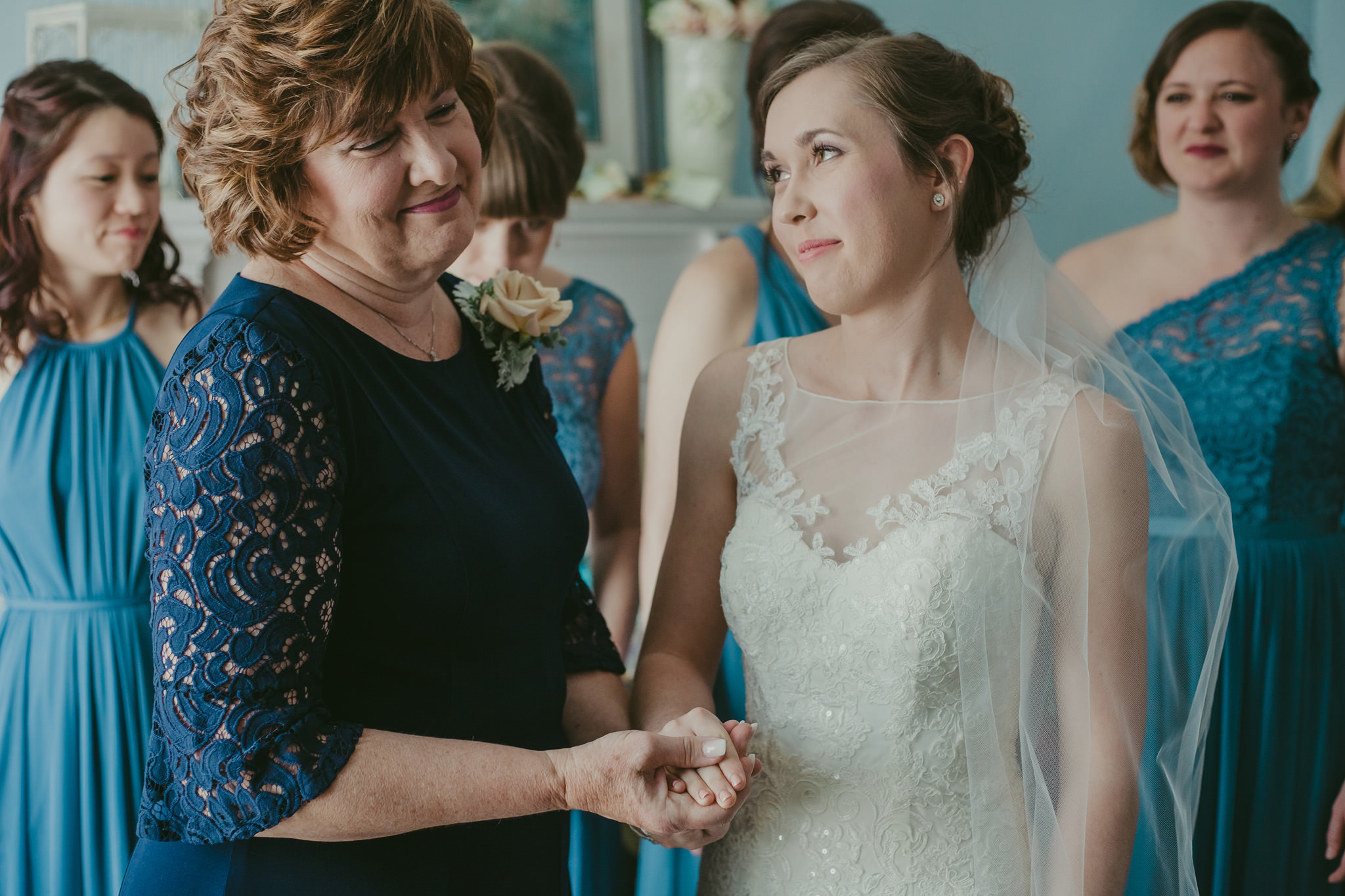 A mother and daughter have a moment before she walks down the isle at the Shuford House in Hickory, NC
