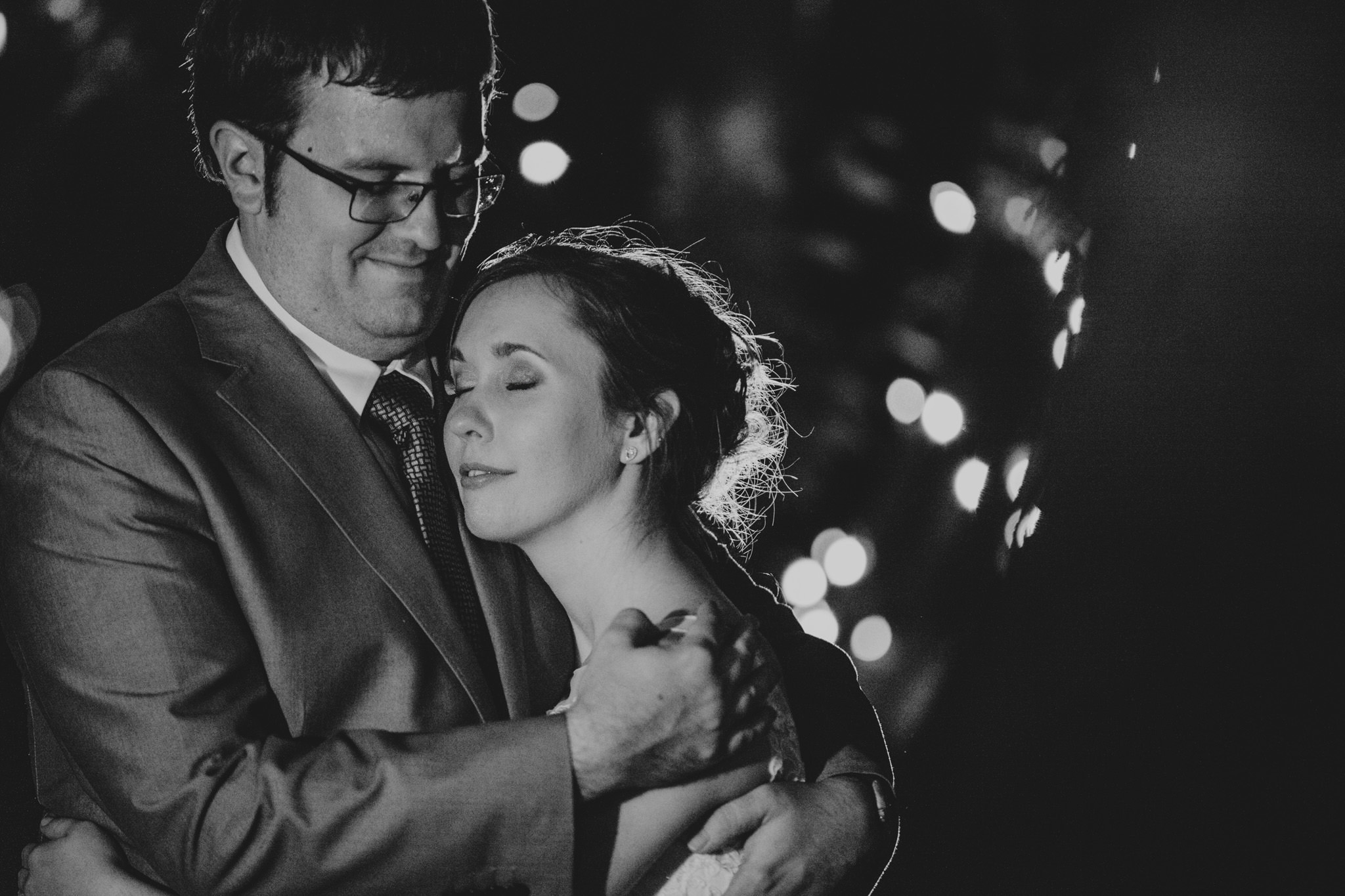 Nightime wedding portrait of the bride and groom at the Shuford House in Hickory