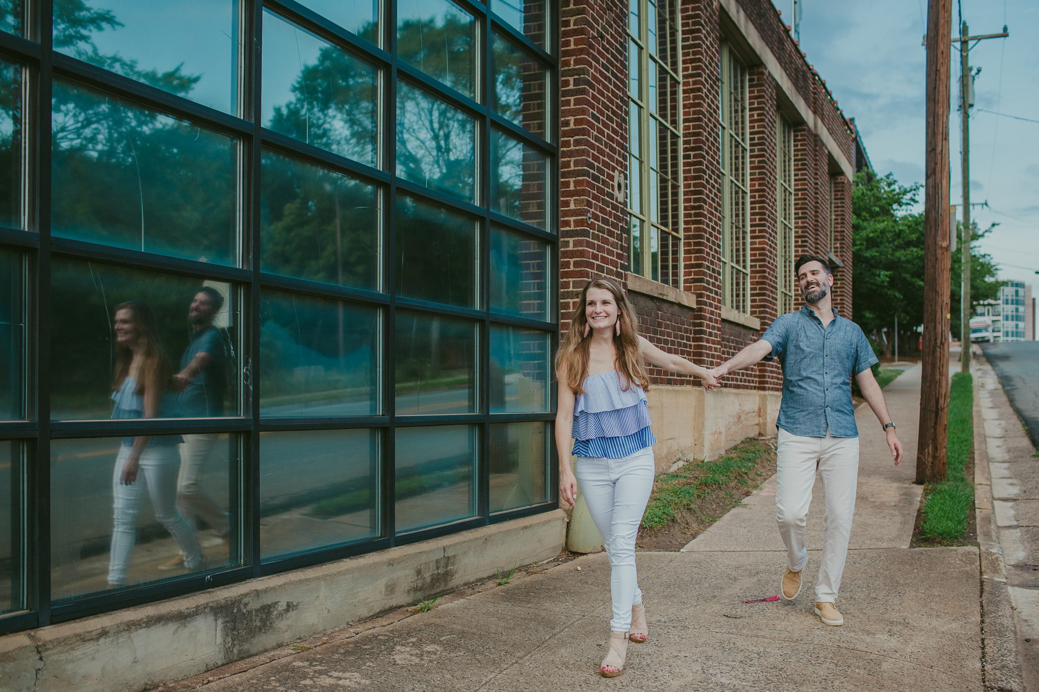 Couple explores South End Charlotte, NC for their engagement session