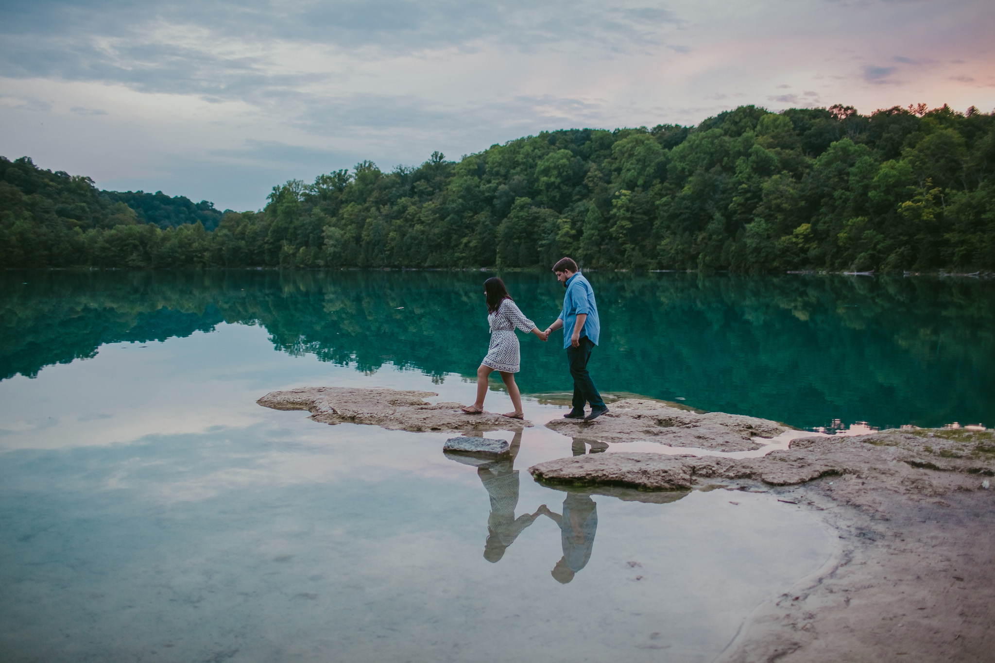A mirrored reflection at this Green Lakes State Park engagement