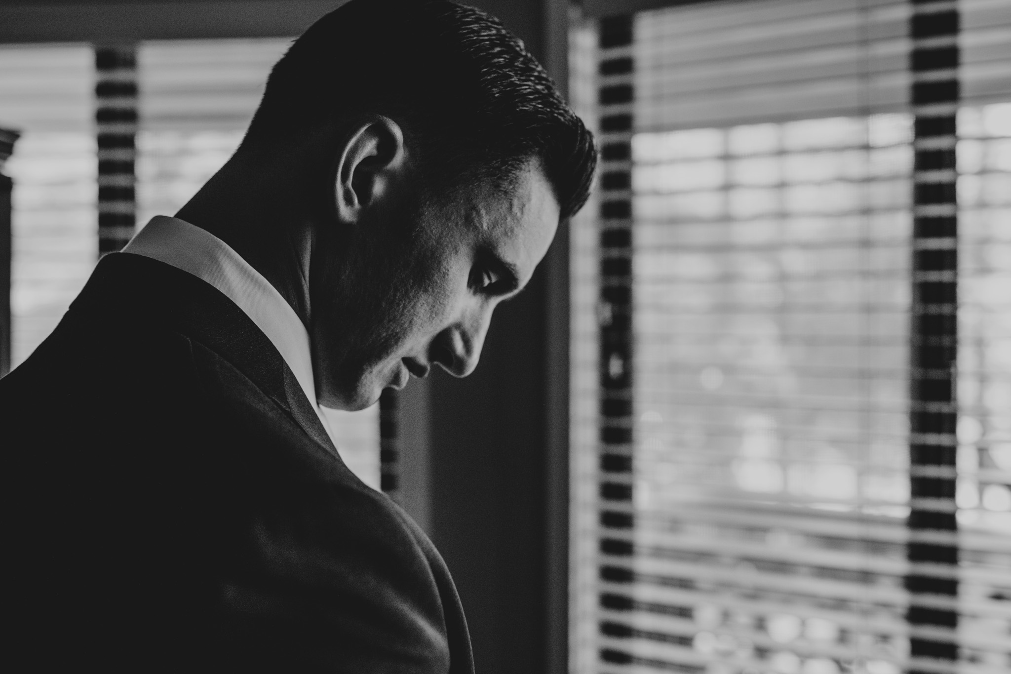 Portrait of a groom as he gets ready for his Crest Pavilion Wedding in Asheville