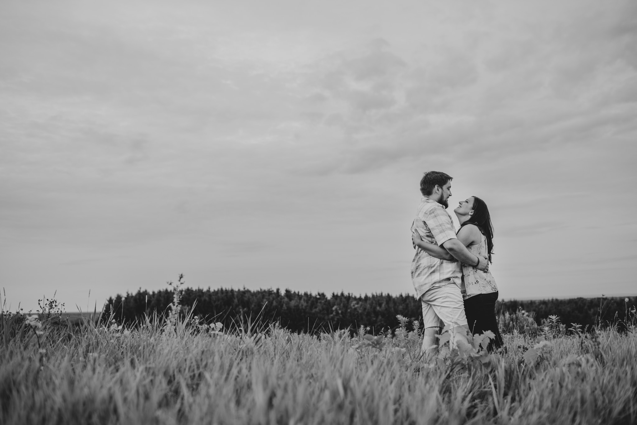 Couple in field at Green Lakes State Park in Fayetteville, NY