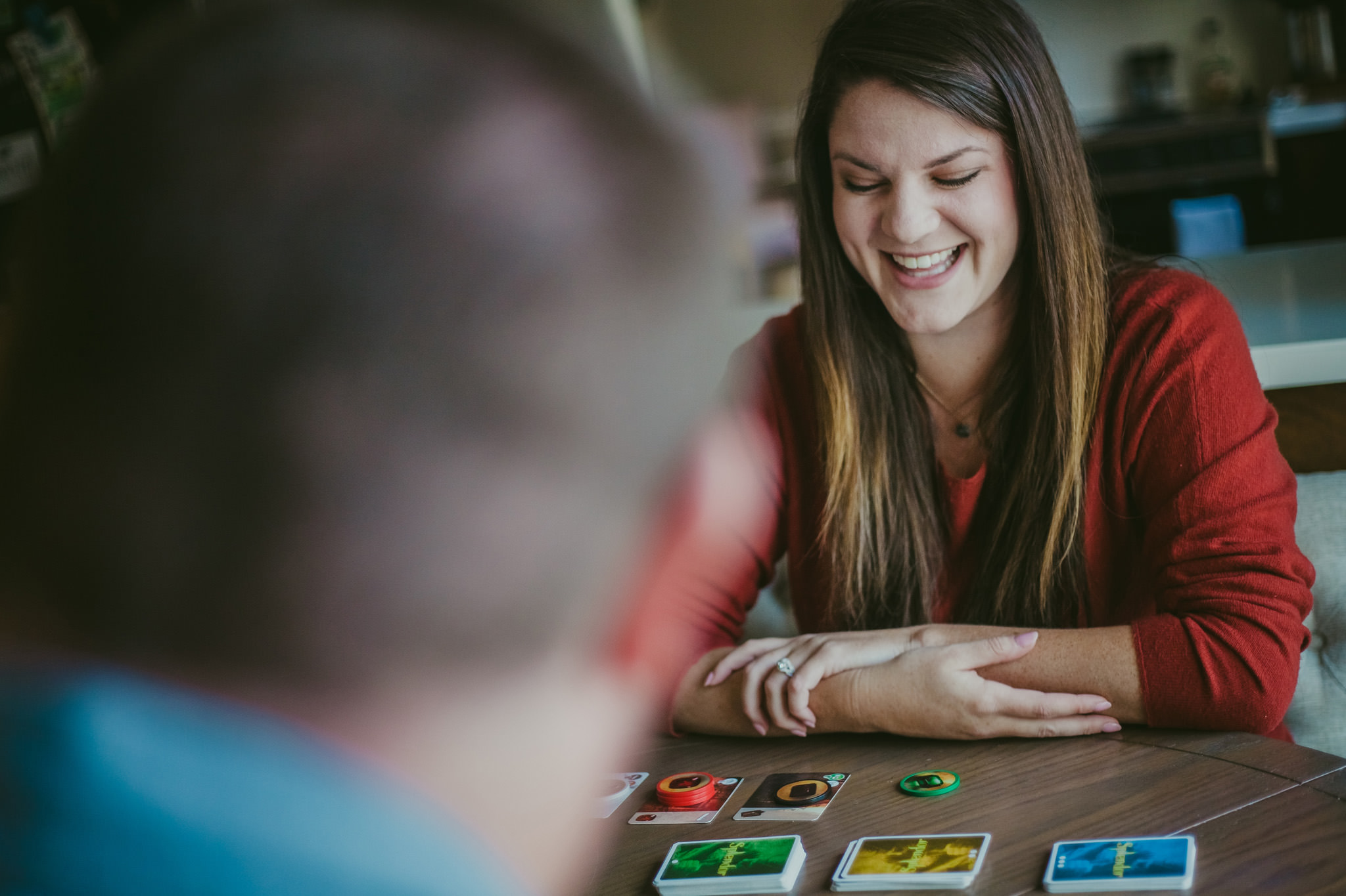 Board game fun during this at home engagement session in Charlotte, NC