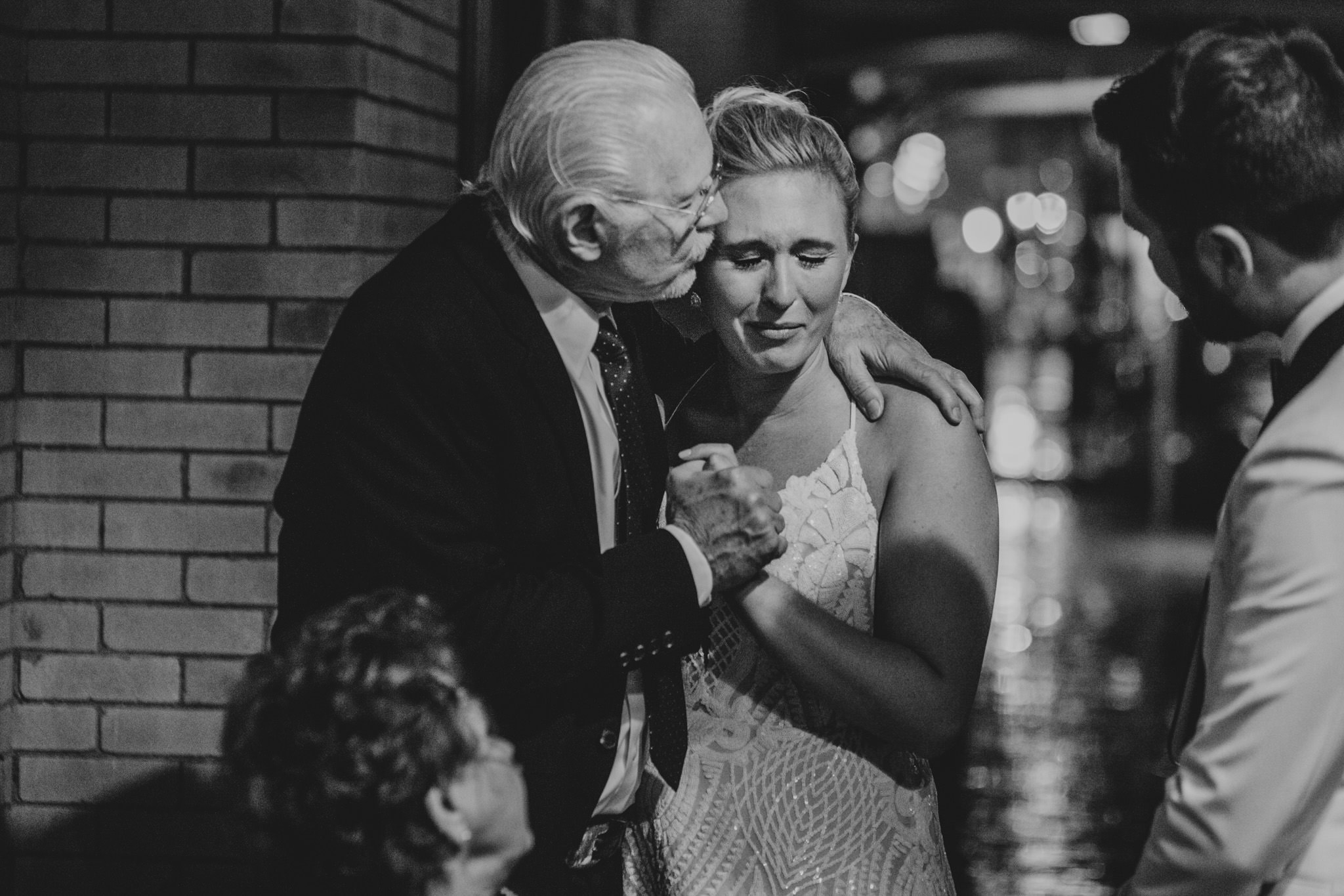 Bride and grandfather share a sweet moment at 214 Martin St. 