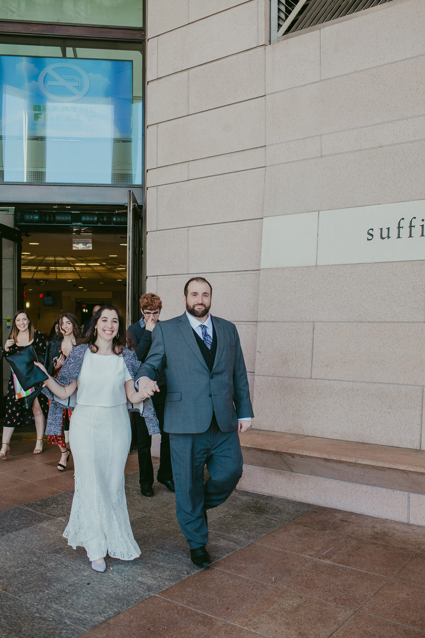 Newlyweds leave the mecklenburg county courthouse as husband and wife