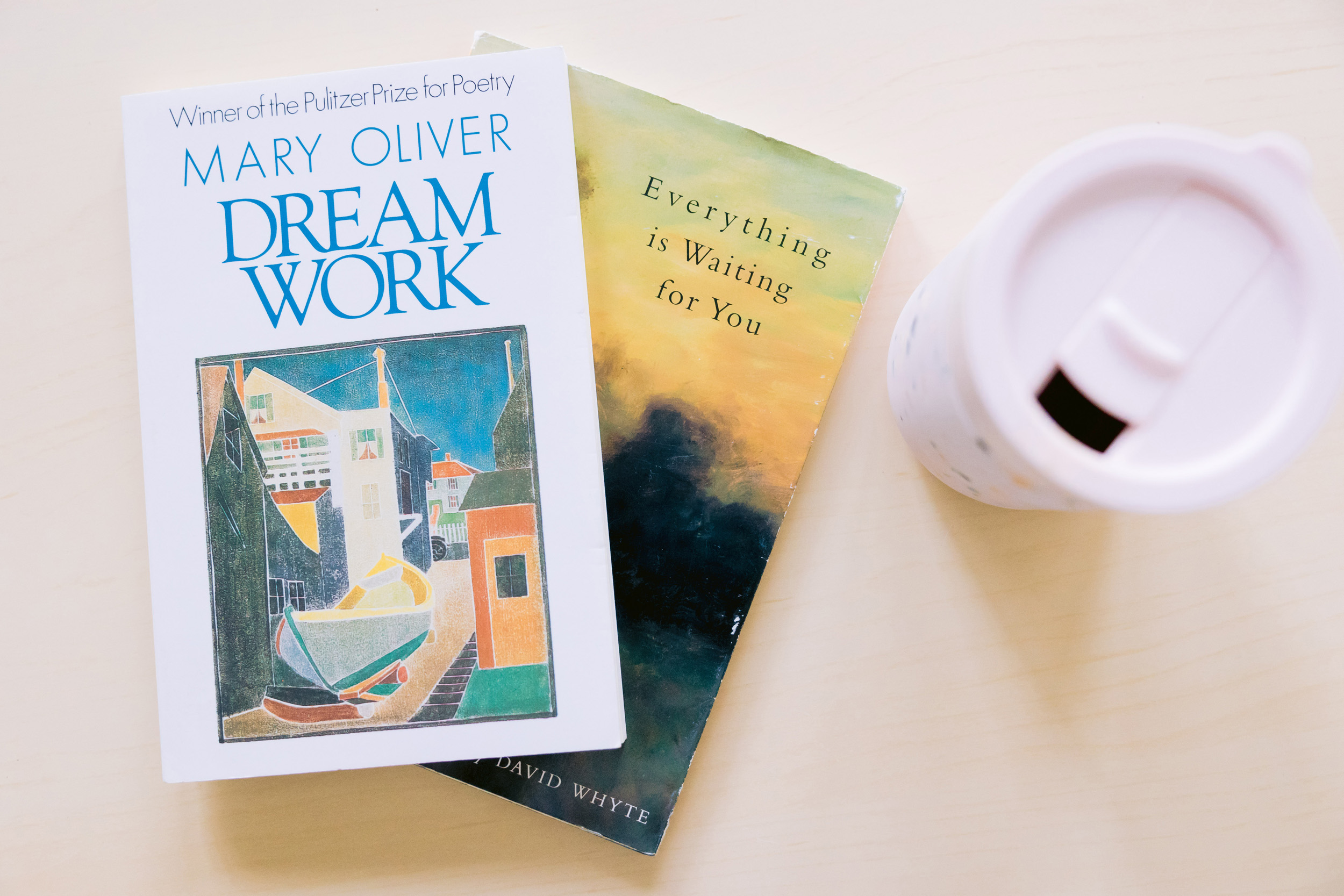 A vibrant image of the Dream Work by Mary Over, surrounded by books and coffee, photographed by Mabyn Ludke.